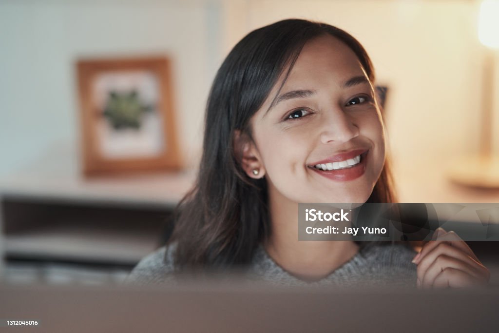 I'm here to do mighty things as an entrepreneur Portrait of a young businesswoman working in an office at night 20-29 Years Stock Photo