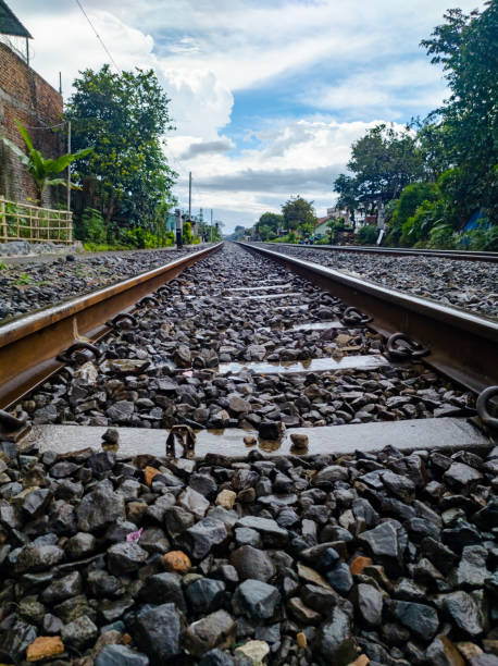 istock Railroad tracks shoot after rain. low angle view. 1312045075
