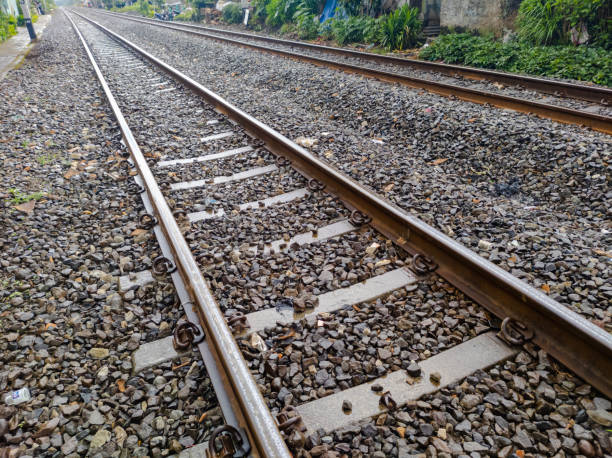 istock Railroad tracks shoot after rain. Leading line view 1312045086
