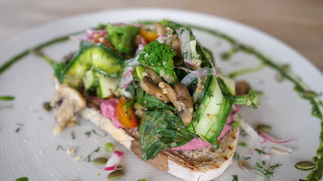 Healthy vegan brunch. Sandwich with all sorts of green vegetables