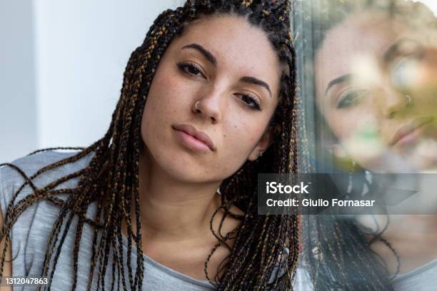 Young Woman With Dreadlocks And Nose Piercing Stock Photo - Download Image Now - Nose Ring, Pierced, Young Women