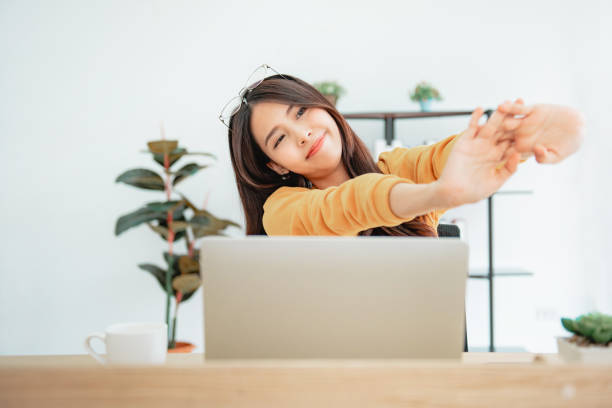 Happy relaxed young woman sitting after using laptop. Happy relaxed young woman sitting after using laptop. pool break stock pictures, royalty-free photos & images