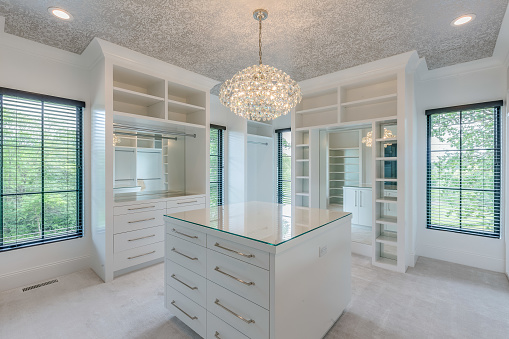 Luxurious closet with ample space for all clothes and shoes