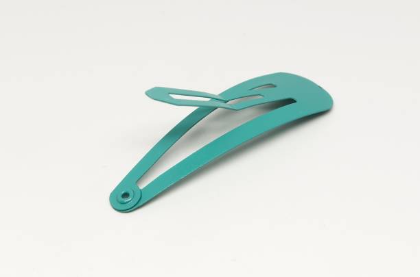 istock Surf green hairpin isolated on white background 1312054893