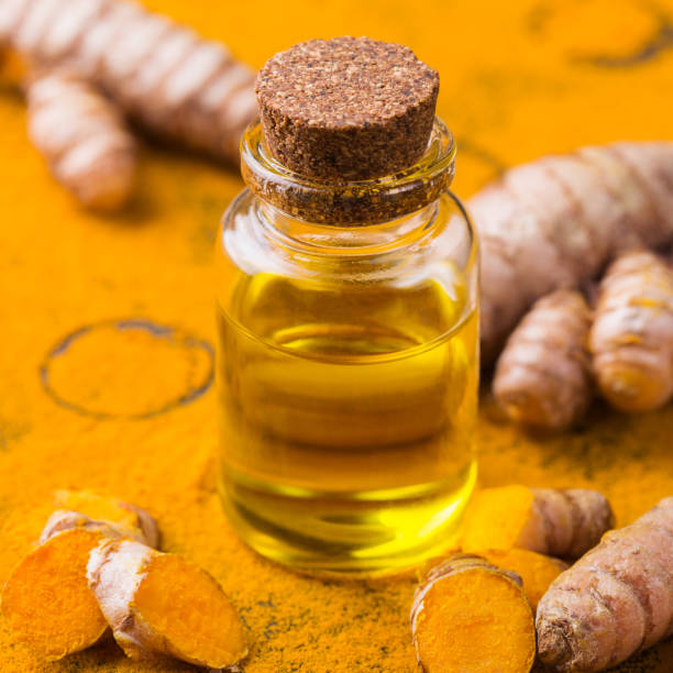 istock Turmeric essential oil, orange root and powder, beauty and spa 1312055819