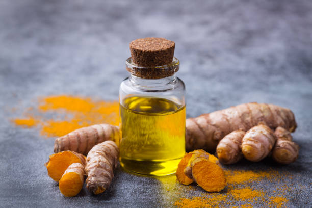 istock Turmeric essential oil, orange root and powder, beauty and spa 1312056148