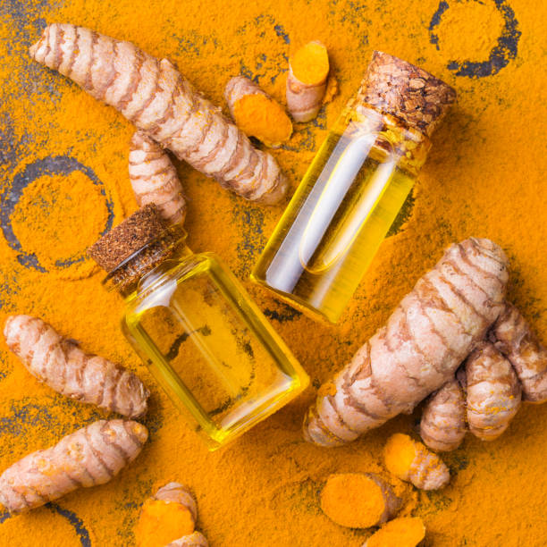 istock Turmeric essential oil, orange root and powder, beauty and spa 1312056201