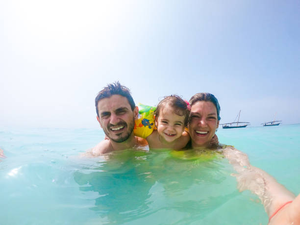 istock Young family enjoying vacation 1312057504
