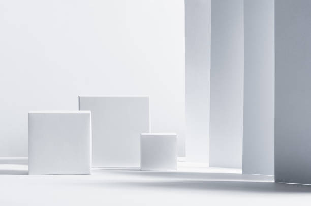 istock White square podiums in sunlight with shadow on white striped perspective background. Trend fashion showcase for cosmetic products, goods, shoes, bags, watches. 1312059964