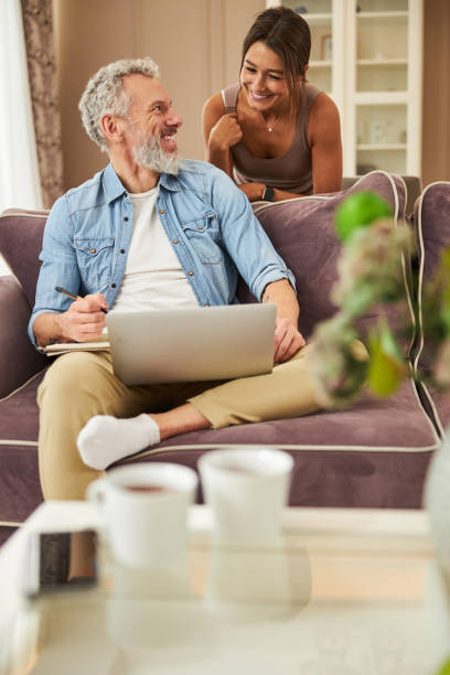 istock Happy couple spending their weekend at home 1312060064