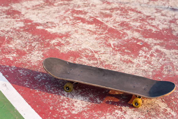 istock Close up surf skate or skateboard at park sunset 1312060107