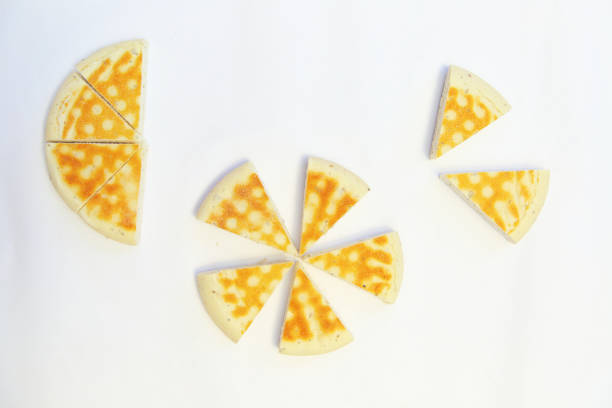 istock Golden leavened pancake which is cut and placed into different shapes, top view 1312063855