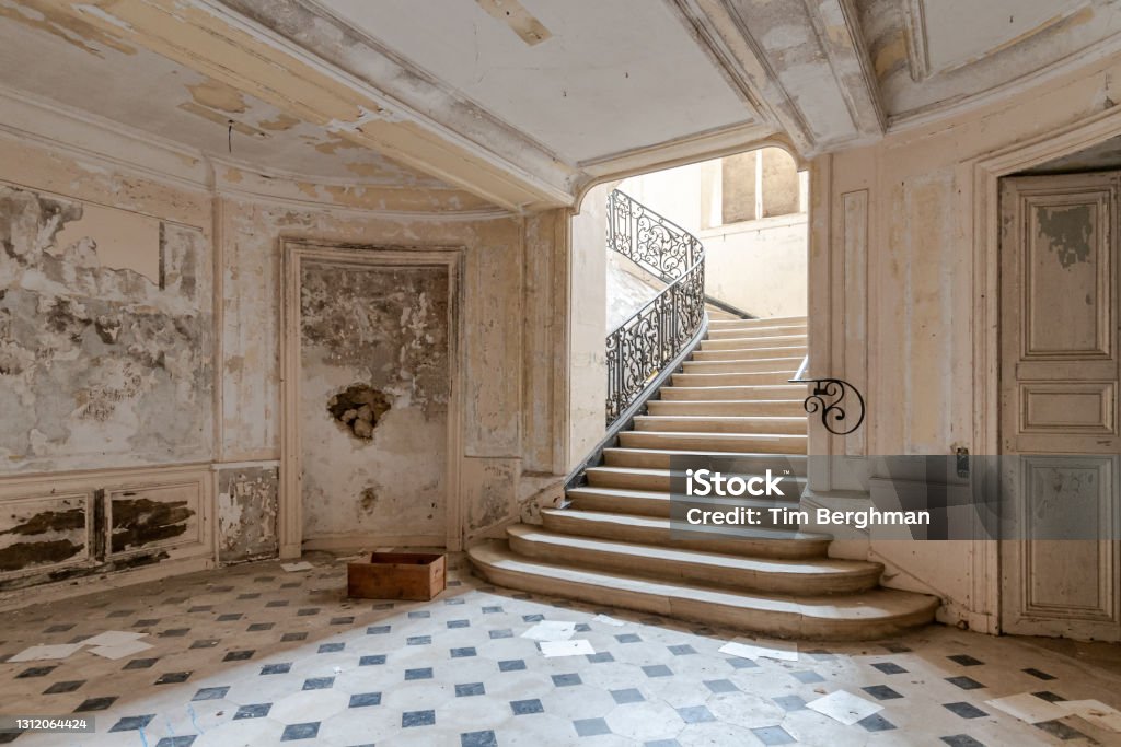 Spacious stairwell in a ruined empty castle Castle Stock Photo
