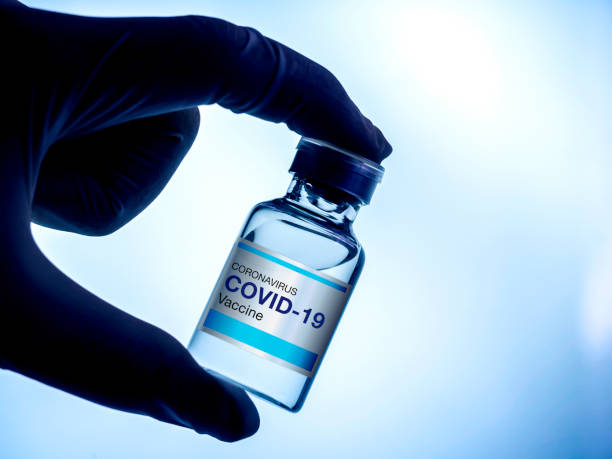 istock Covid-19 Coronavirus vaccine bottle with label. 1312065389