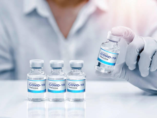 istock Covid-19 Coronavirus vaccine bottle with label. 1312065538