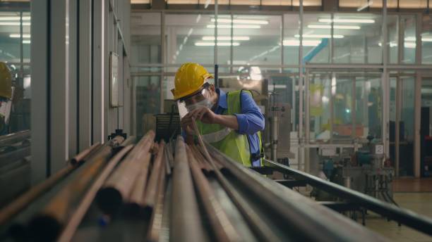 istock worker man technician or engineering wearing protective helmet uniform look over the steel pipe 1312066507