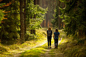 Spring walk in the green forest