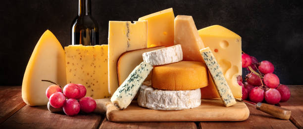 istock Cheese panorama with grapes and a bottle of wine 1312067068