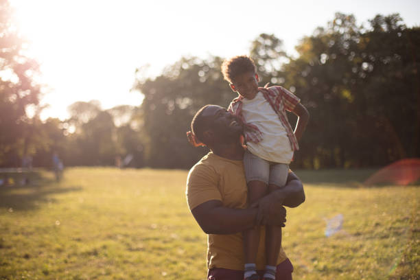 istock African American father and son in nature. 1312067344