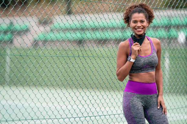 istock Female tennis player with protective face mask 1312071344