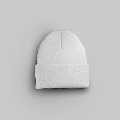 Mockup of trendy winter headgear folded textured beanie for design presentation. Blank hat template for men, women isolated on background, accessory for advertising in online store