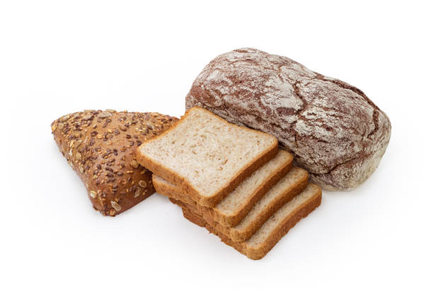 istock Brown bread, slices of toast bread and multigrain triangular bun 1312073324