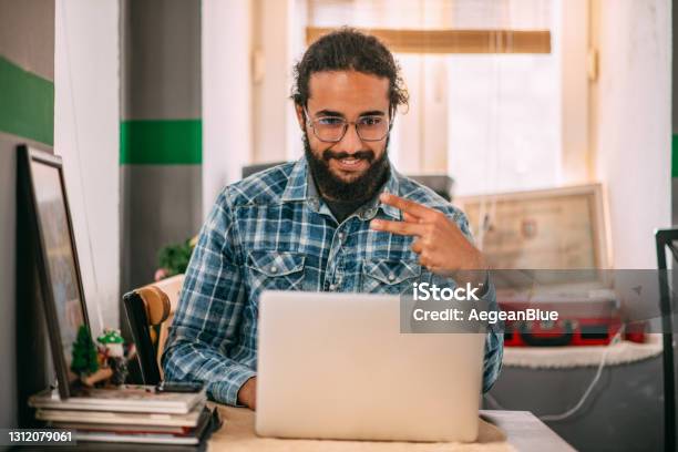 Young Man Having A Video Call With Sign Language On Laptop Stock Photo - Download Image Now