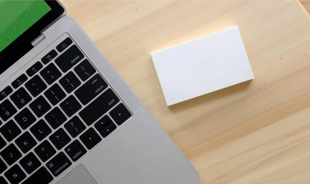 istock Top view desk office table for business work 1312081091