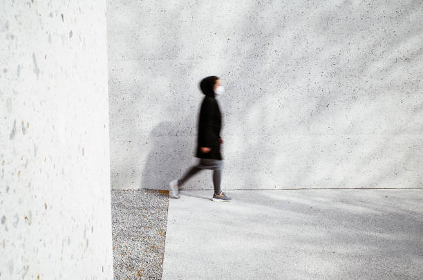 istock Walking blured woman 1312081818