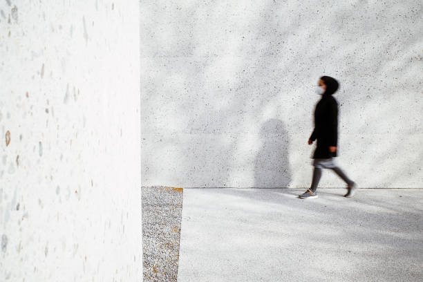 istock Walking blured woman 1312081862