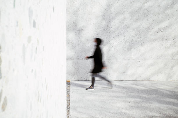 istock Walking blured woman 1312081868