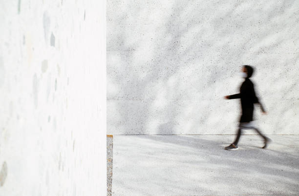 istock Walking blured woman 1312081884