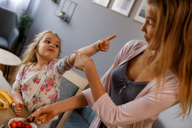 istock Mother and daughter having a playful bonding moment while making breakfast 1312082515
