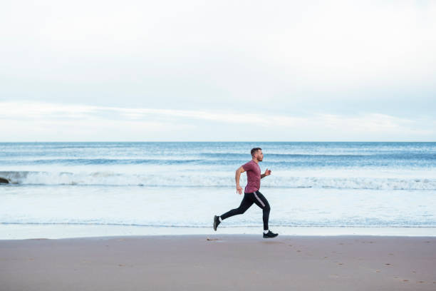 istock Running Along the Coastline 1312082619