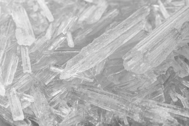 Heap of menthol crystals as background, top view