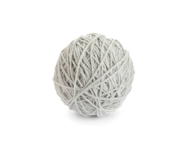 istock Soft grey woolen yarn isolated on white 1312083851