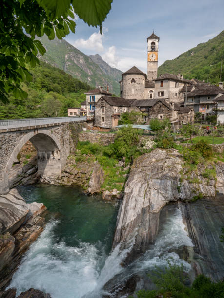 istock Waterfall and typical stone village in Ticino 1312088560