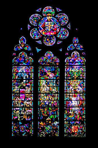 Stained glass shot of the cathedral Notre-Dame de Verdun built in the tenth century in Romanesque style, then between the XIV and XVI century remodeled in Gothic style and finished in the eighteenth century in Baroque style, at 18/135, 3200 iso, f 4.5, 1/160 second