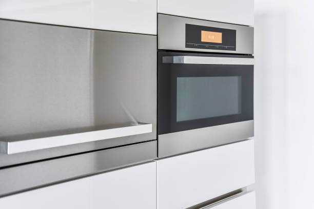 istock Modern oven and cabinets in kitchen 1312091789