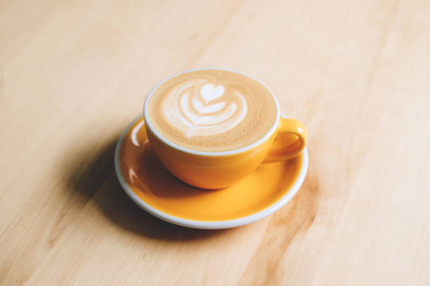 istock Fresh flavored coffee art is on the wooden table. 1312093172