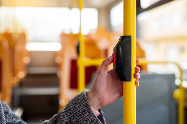 hand Stop Button On Bus stock photo