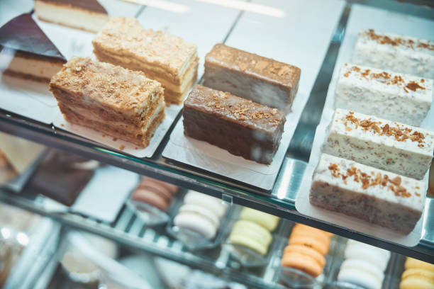 istock Pieces of various desserts lined up under the glass 1312096314