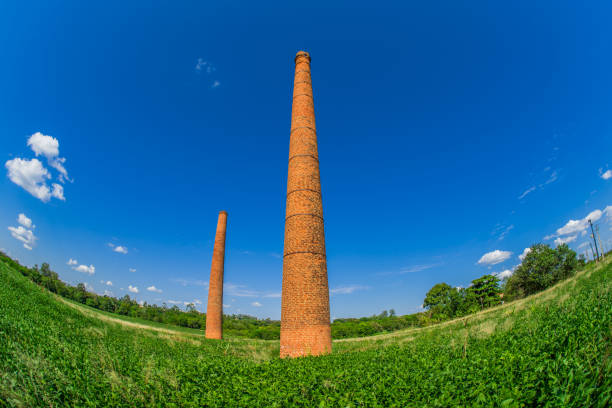 Chimneys. Old factory, abandoned and isolated.
