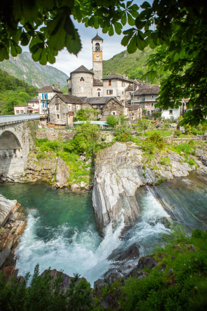 Waterfall and typical stone village in Ticino Ticino canton, Switzerland lepontine alps stock pictures, royalty-free photos & images