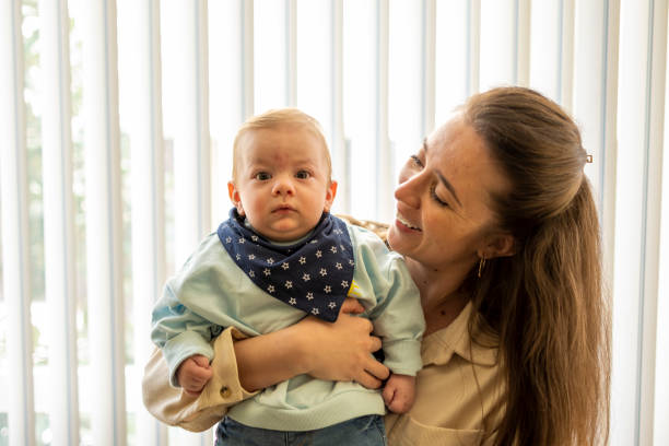 istock Mother happiness her newborn baby boy 1312105247