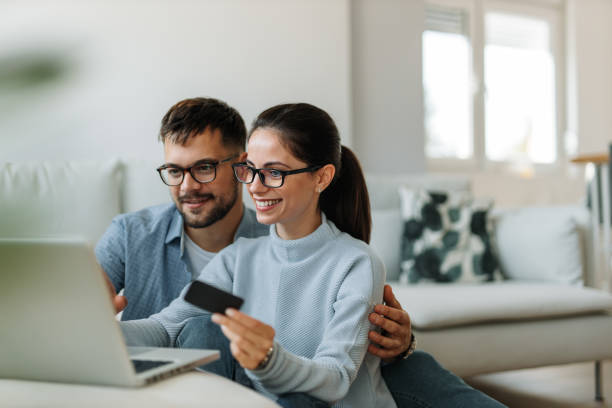 istock Searching online and buying with credit card. 1312105342