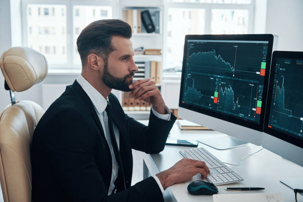 istock Concentrated young man in shirt and tie 1312106340