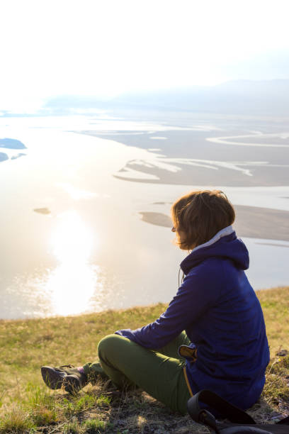 istock Young woman walking in nature 1312106452