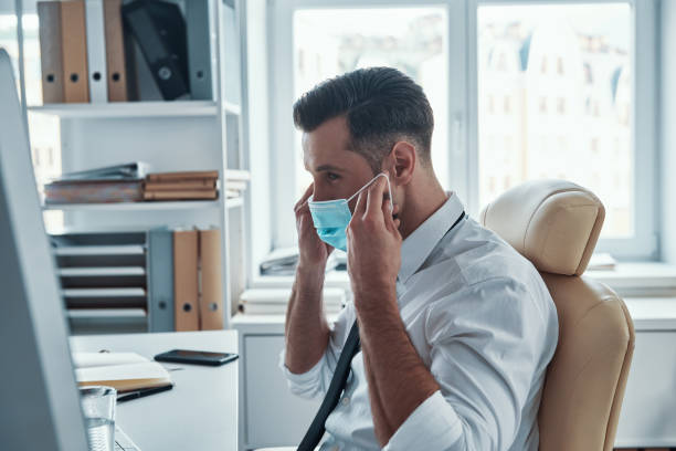 istock Confident young businessman in shirt and tie 1312106898