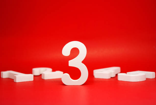 istock No.3 Third or average on Red  Background with Copy Space - Number 3 middle score competition  Concept 1312108181